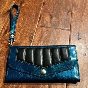 Trophy Queen Teal Tri-fold wallet with leopard lining